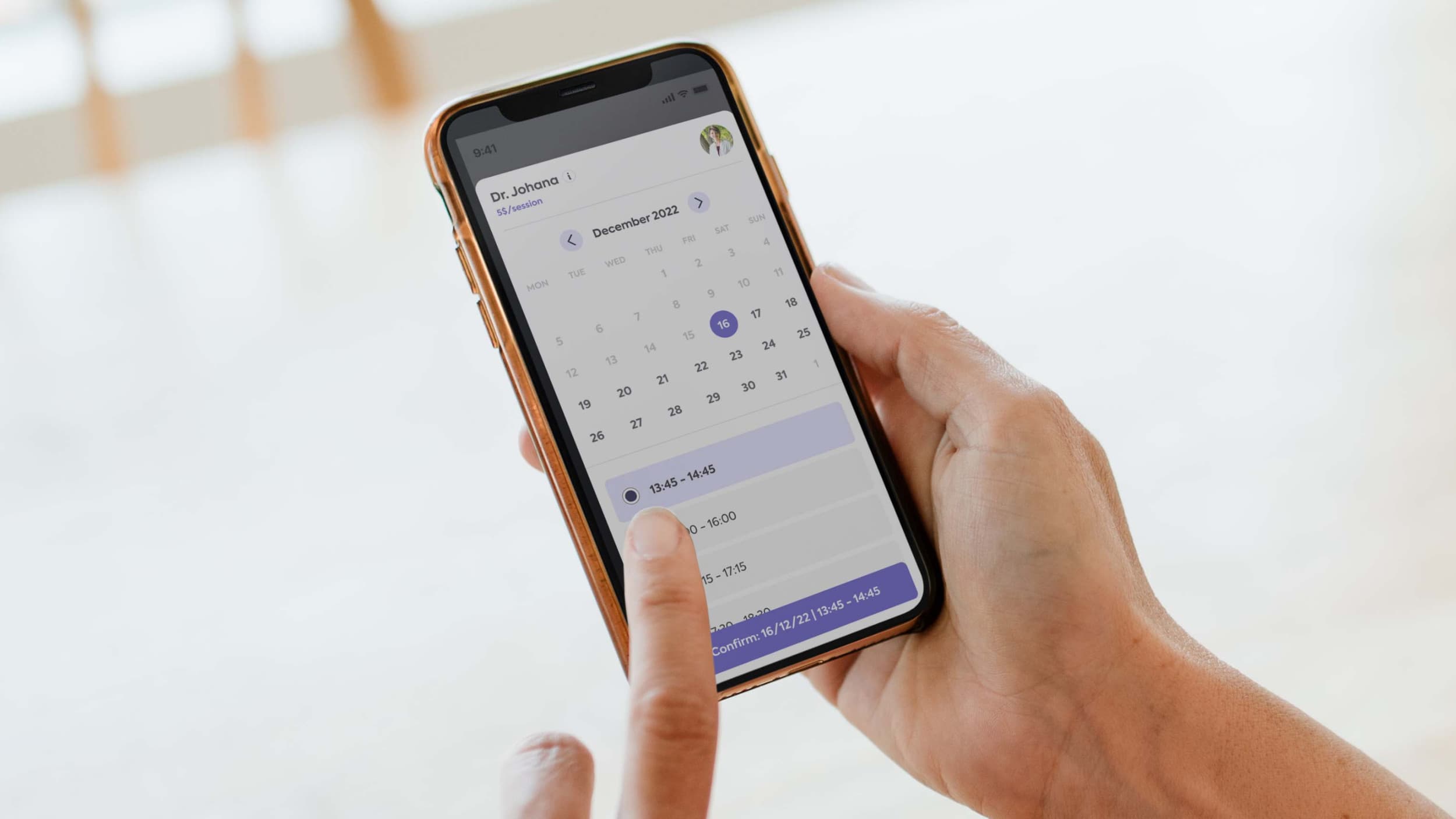 Close up photo of person holding mobile phone showing Cardo Health user interface
