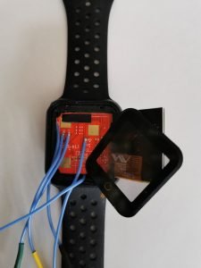 another smartwatch with wires connected