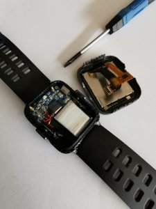 a smartwatch with hardware exposed